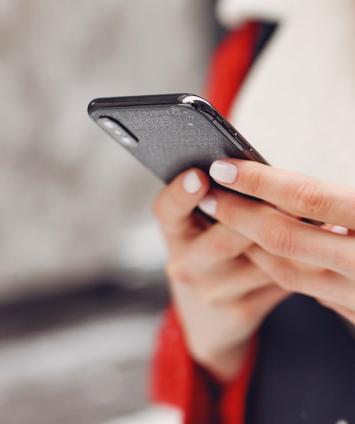 woman-by-building-new